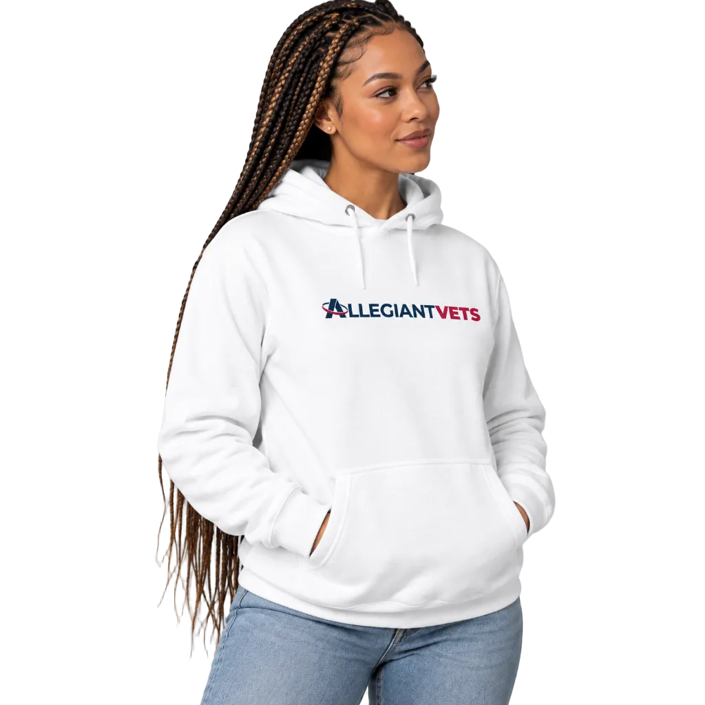 A woman with long braids wearing a white pullover hoodie with a red and blue 'ALLEGIANTVETS' logo on the chest, paired with light blue jeans.