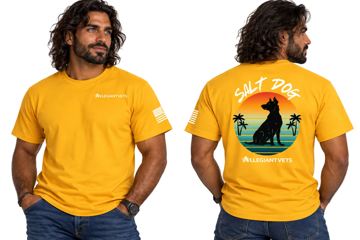 A man modeling a bright yellow t-shirt from the front and back. The front left chest features the 'ALLEGIANTVETS' logo, and the back displays a large graphic of a German Shepherd dog silhouette against a tropical sunset with palm trees, with 'SALT DOG' written above and 'ALLEGIANTVETS' below.