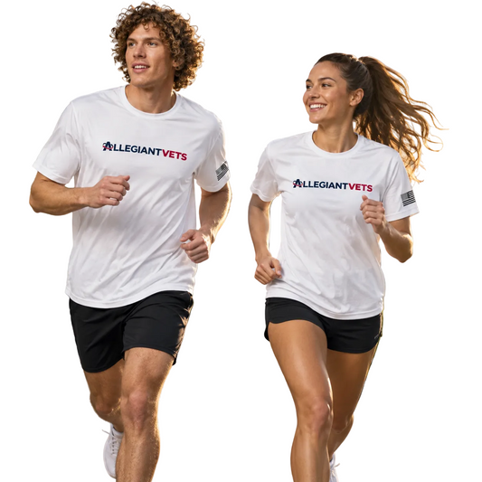 A man and a woman jogging side-by-side on an outdoor path near the water, wearing matching white t-shirts with the 'ALLEGIANT VETS' logo printed on the chest.