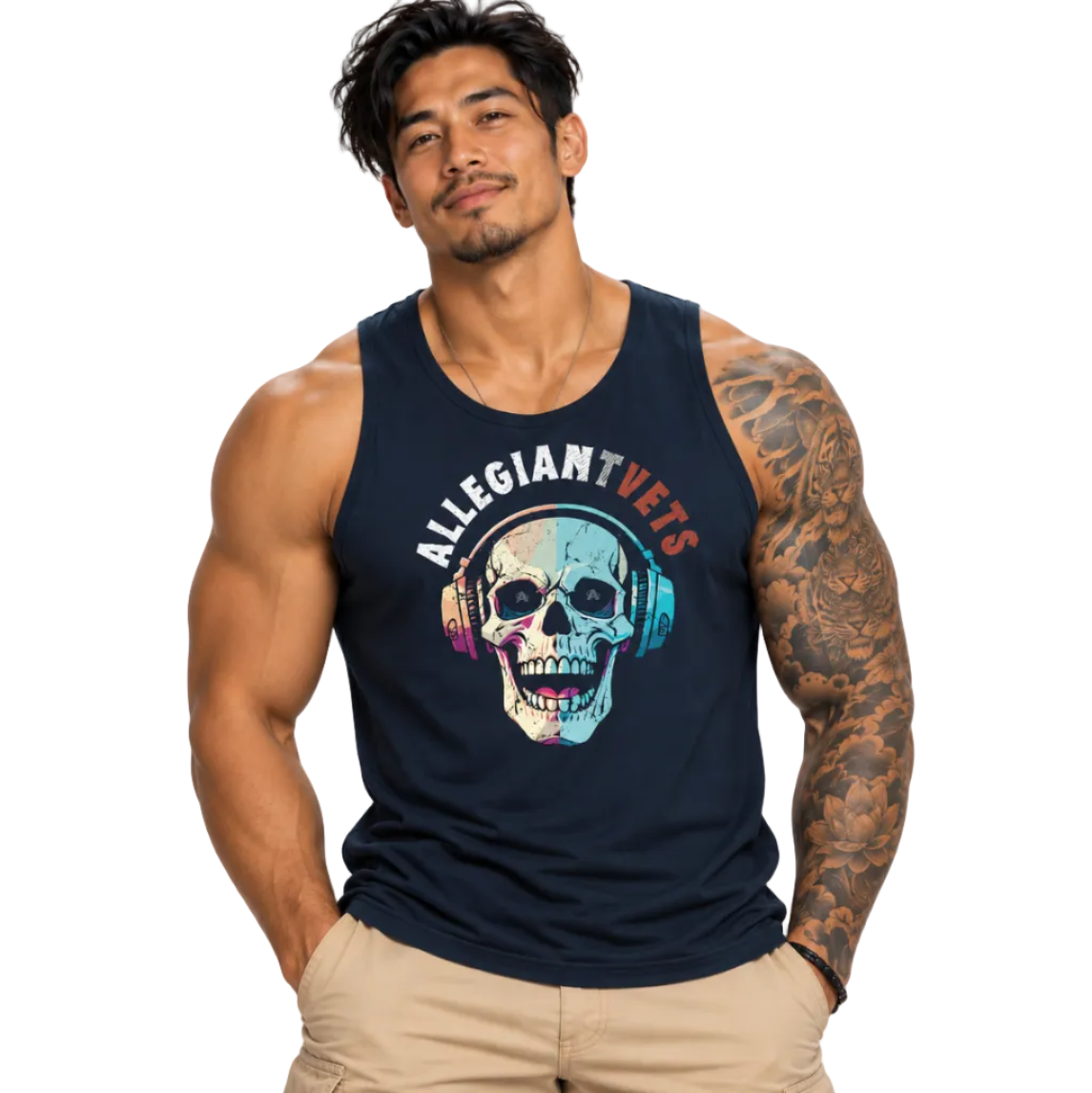 A muscular man wearing a navy blue tank top with a colorful skull graphic and the text 'ALLEGIANTVETS' on the front, paired with khaki pants, against a plain white background.