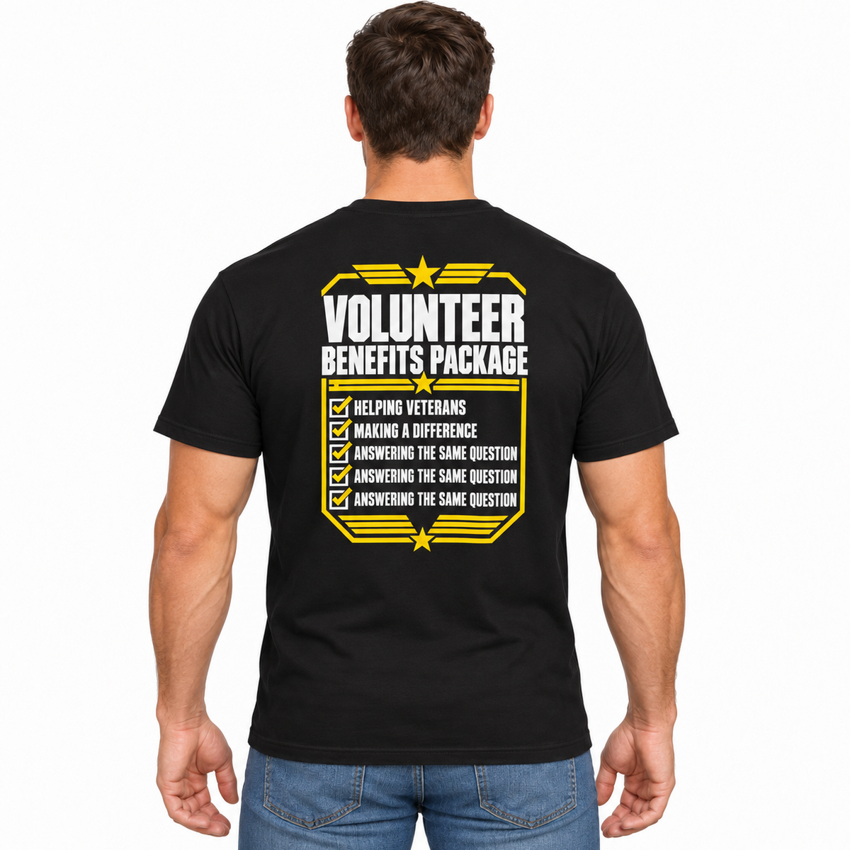 A man viewed from the back wearing a black t-shirt with a yellow and white graphic that reads 'VOLUNTEER BENEFITS PACKAGE' and lists benefits, paired with blue jeans, against a plain white background.
